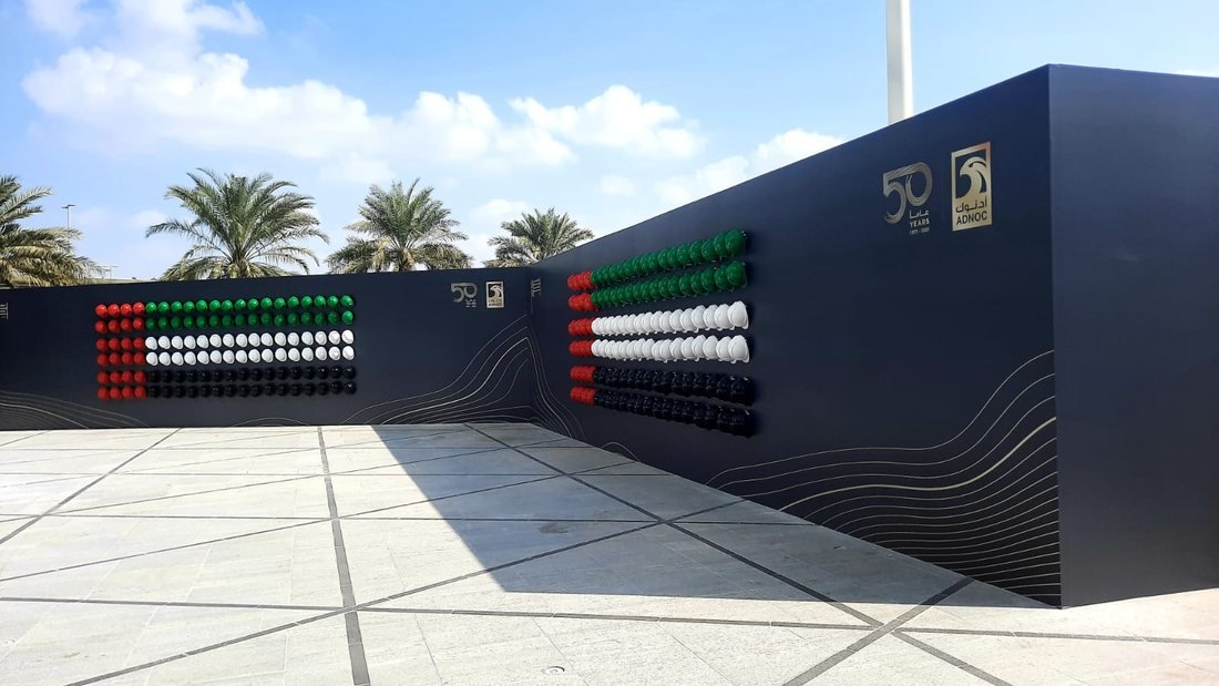 Printed hoarding graphics along a site boundary