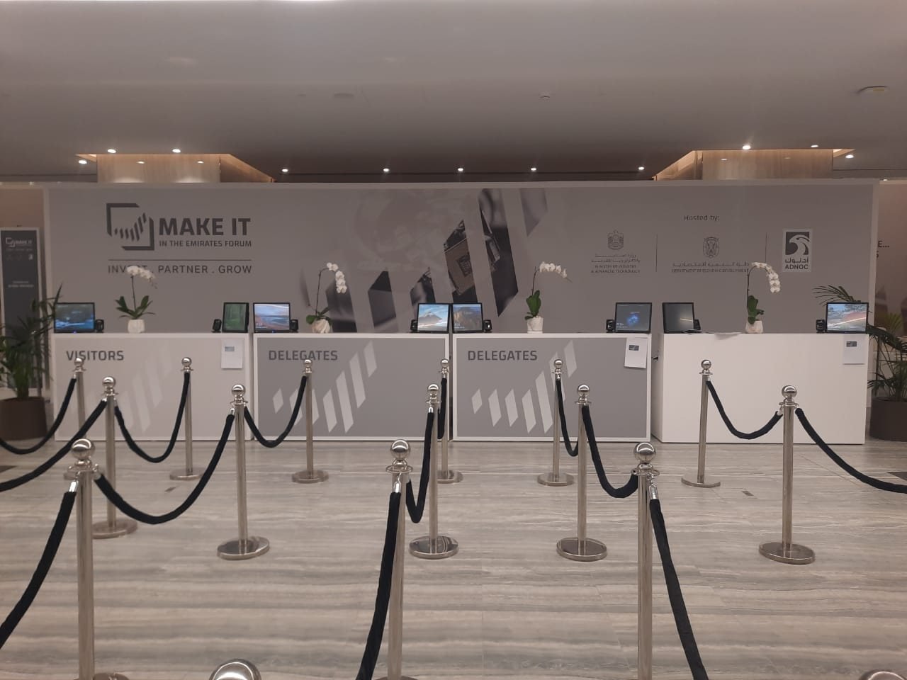 Branded registration counters and backdrop for the Make it in the Emirates forum
