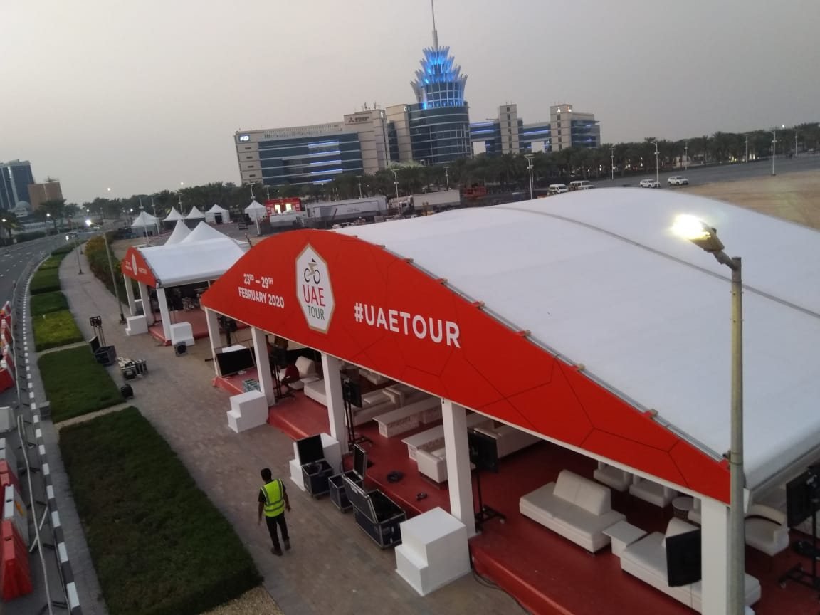UAE Tour branding on the fascia of a hospitality tent